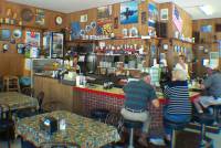 Little Amsterdam Coffee Shop interior photo.